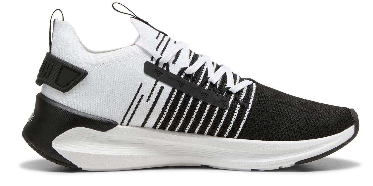 Black and white athletic shoe.