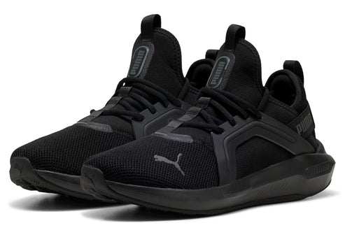 Pair of black sneakers featuring a lace-up closure and the text "Puma" on the tongue and side.