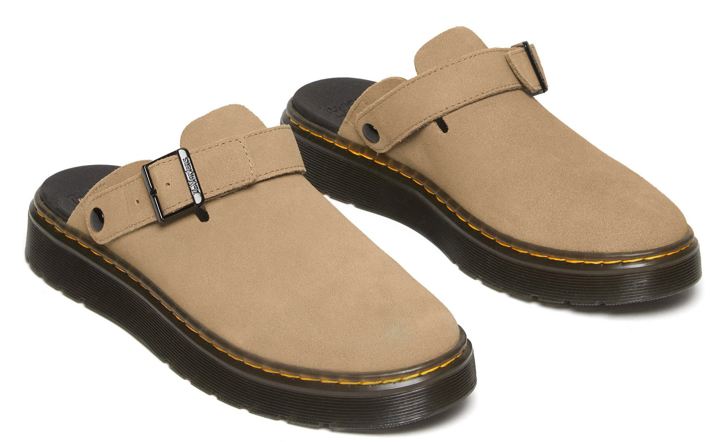 Two khaki-colored clogs with buckle straps and thick black soles featuring visible yellow stitching.