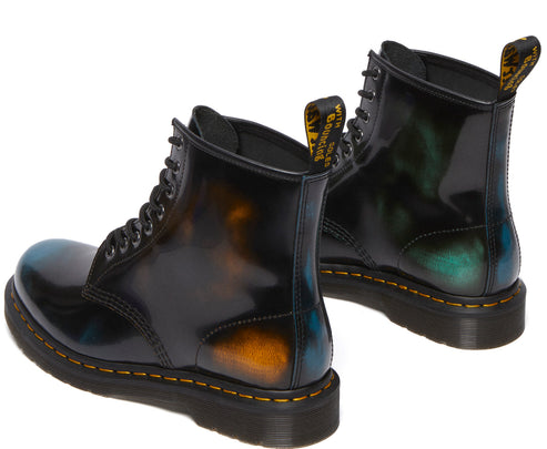 Pair of black boots with yellow stitching and pull tabs, showing color highlights of blue and orange.