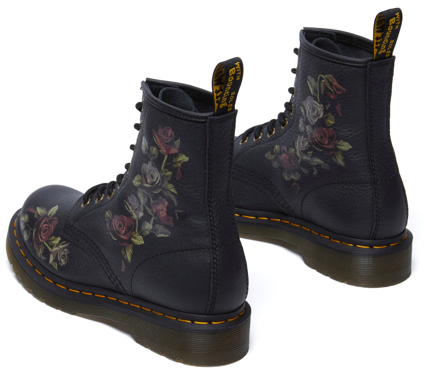 Pair of black leather boots with floral rose print.