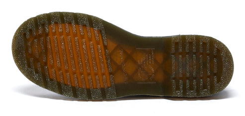 Angled view of a shoe sole featuring linear treads.