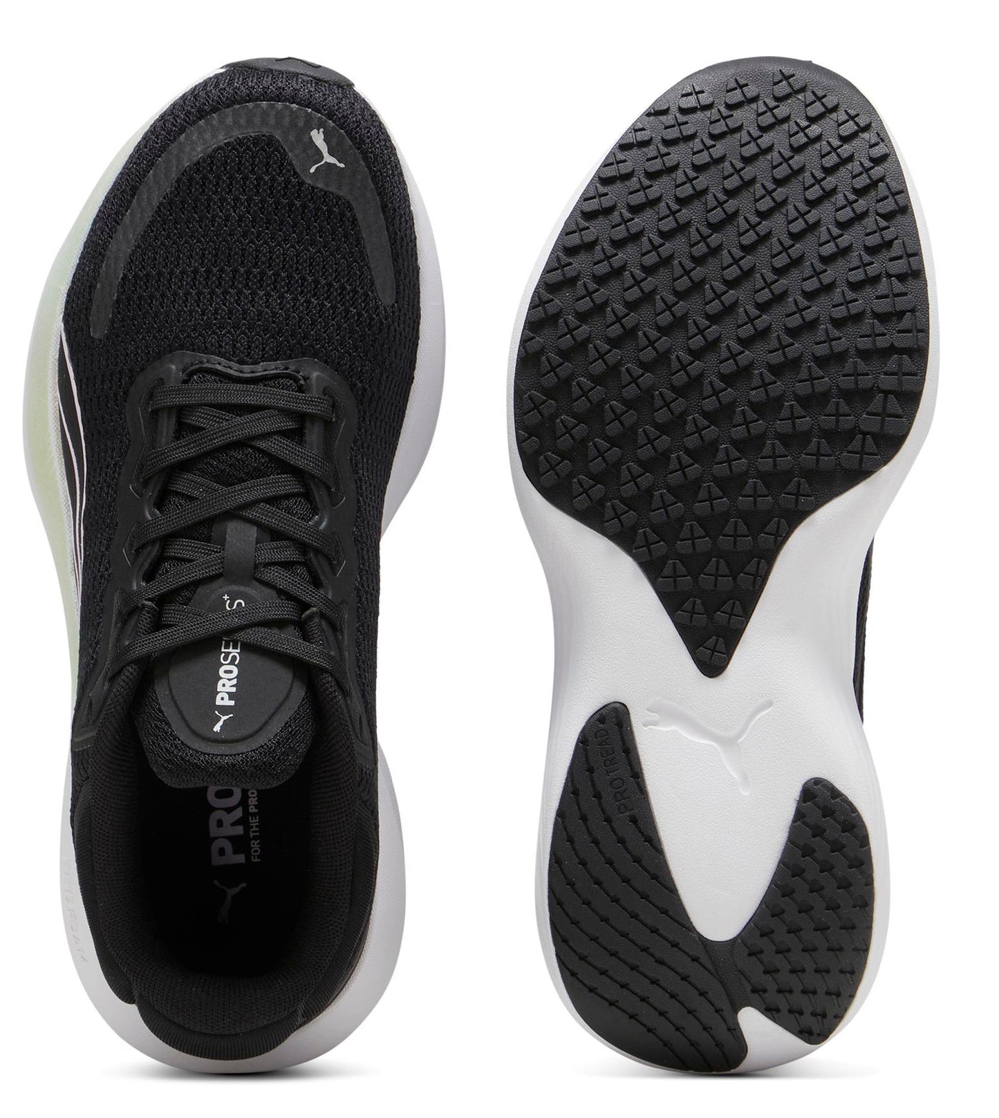 Pair of black sneakers; one shows the top with laces, the other shows a grippy white and black sole and a white logo.