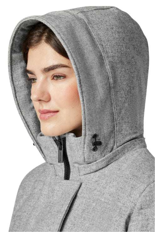 Close-up of woman wearing a gray wool hooded coat with black toggles.