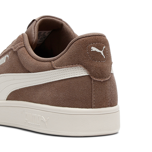 Brown suede sneaker with white side stripe and brand logo at the heel.