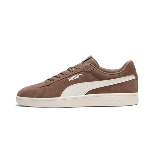 A brown low-top suede shoe with a white stripe along the side.