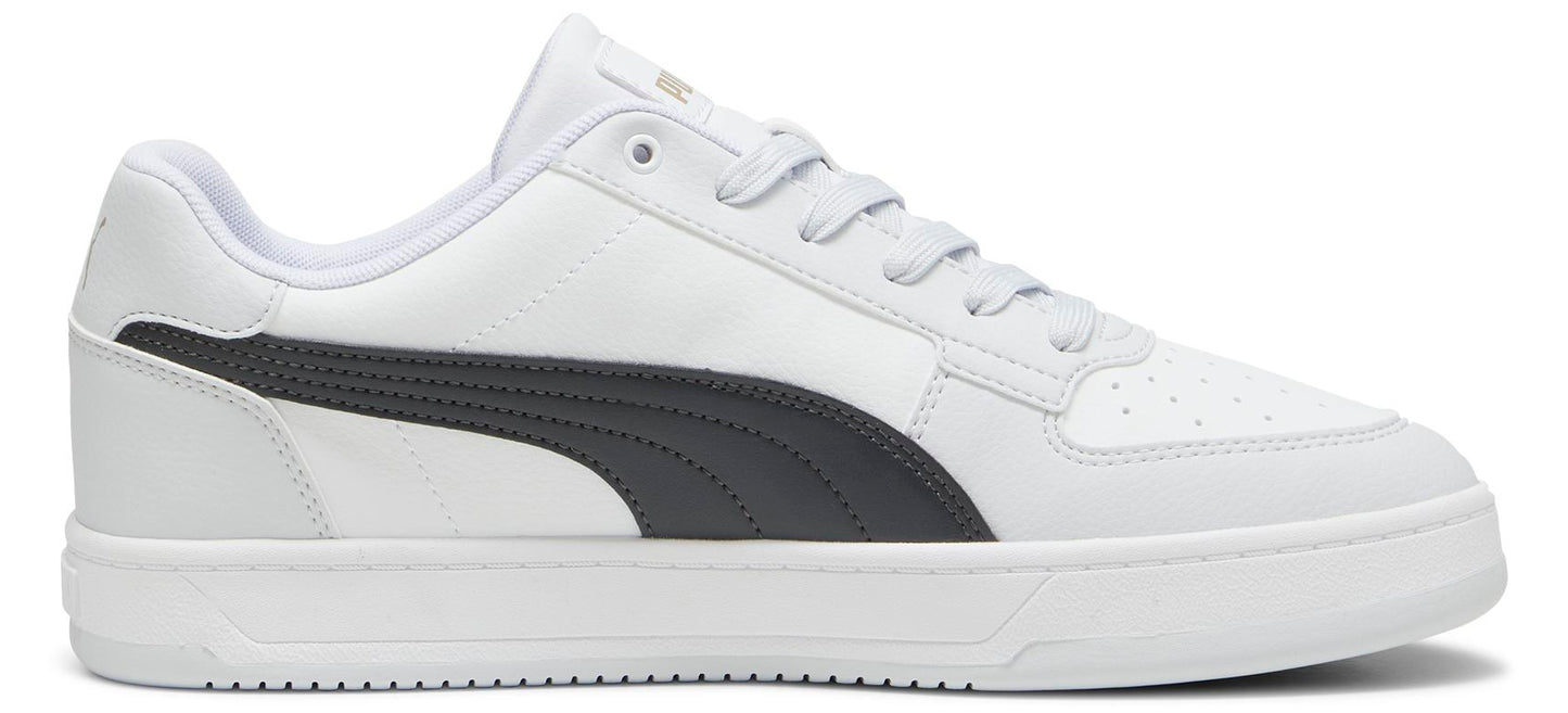 White leather sneakers with a dark gray stripe on the side.