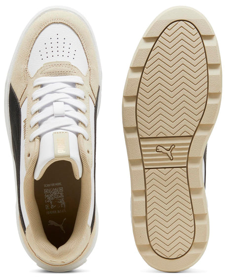 White and beige sneaker with a zig-zag pattern sole.