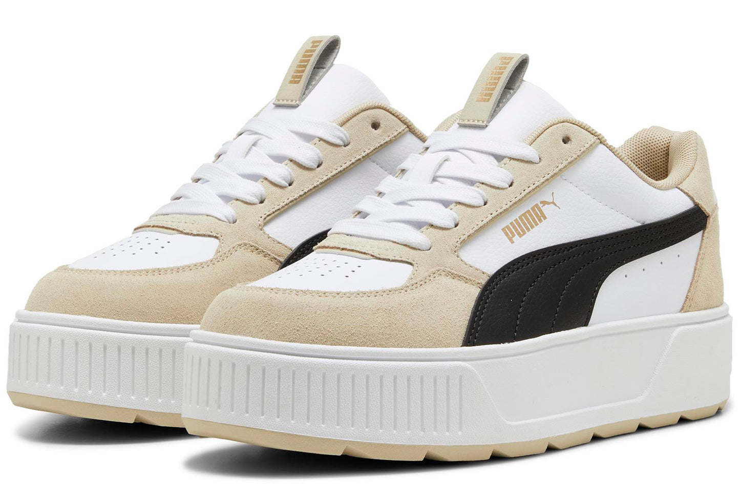 A pair of white sneakers with a black stripe on a thick white platform sole.