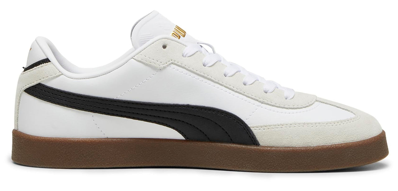A white sneaker with a black stripe on a brown sole.