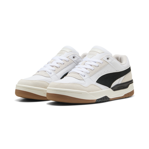 Pair of white sneakers with black accents and gum soles.
