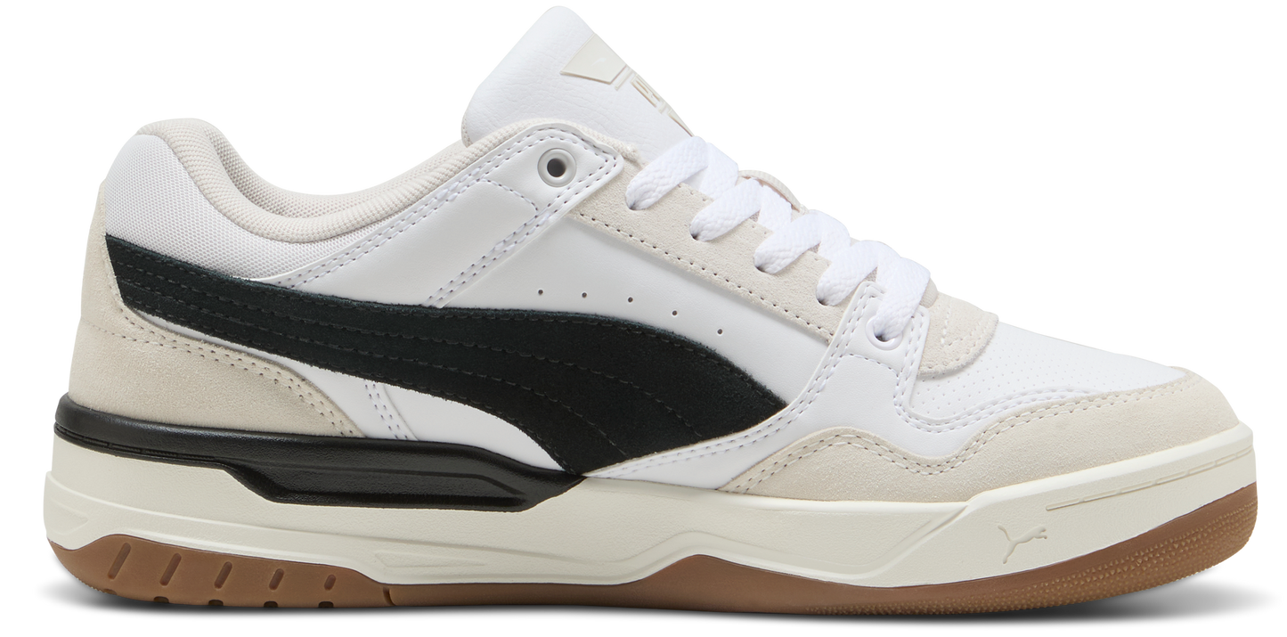 A white sneaker with black accents and a gum sole.