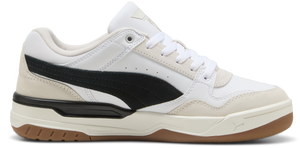 A white sneaker with black accents and a gum sole.