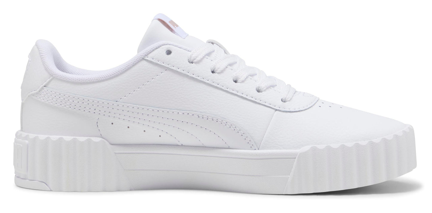 A white sneaker with a textured sole.