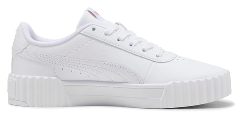 A white sneaker with a textured sole.