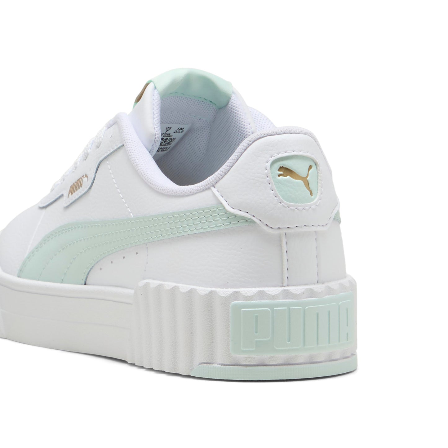 Close up view of white sneaker with mint accents, heel and side stripe, and gold logo detail.