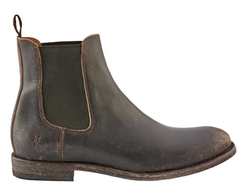 A brown leather Chelsea boot, featuring an elastic side panel.