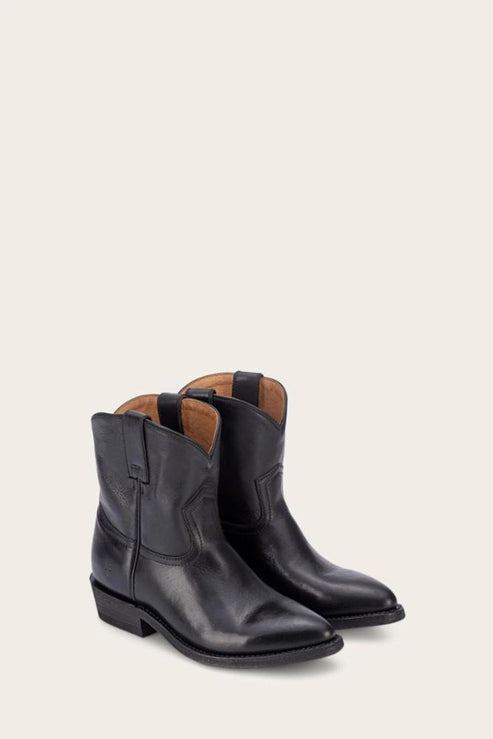 Pair of black leather western boots with pointed toes.