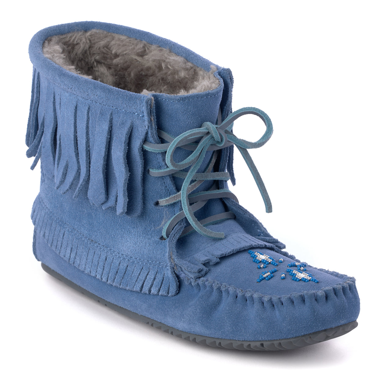 Blue moccasin boot with fringe and beadwork.
