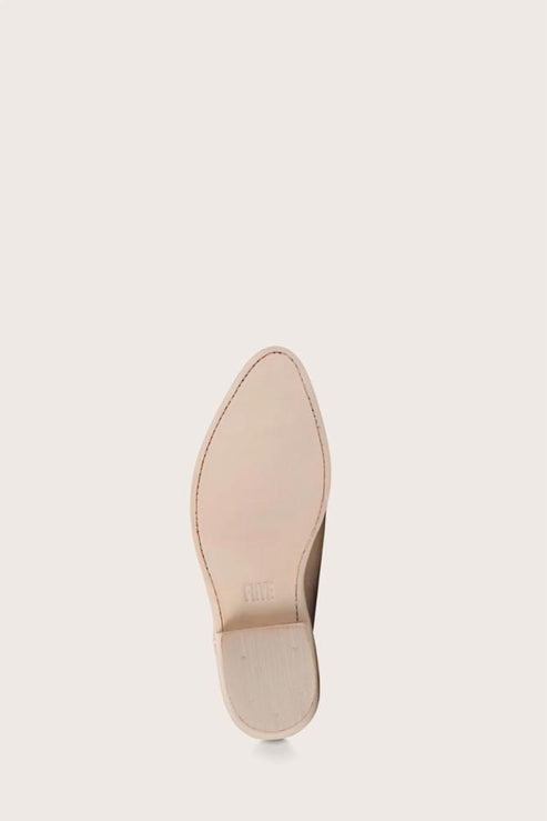 Sole of a tan leather shoe with pointy front.