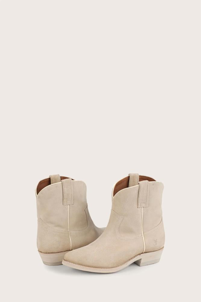 Two beige ankle boots, pointed toe, side loop.