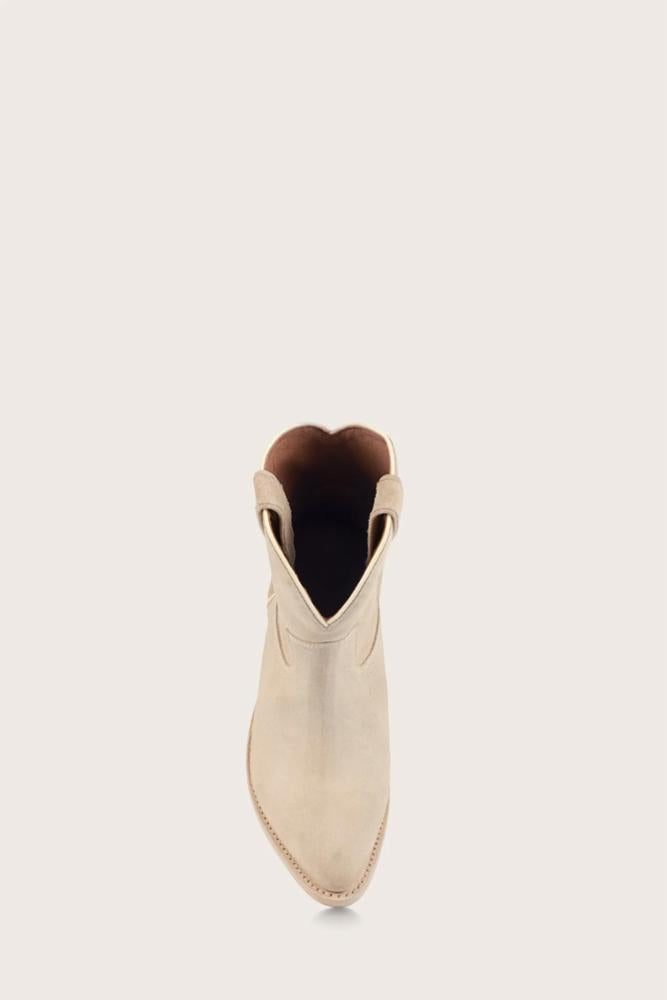 Beige cowboy boot with pointed toe, view from above.