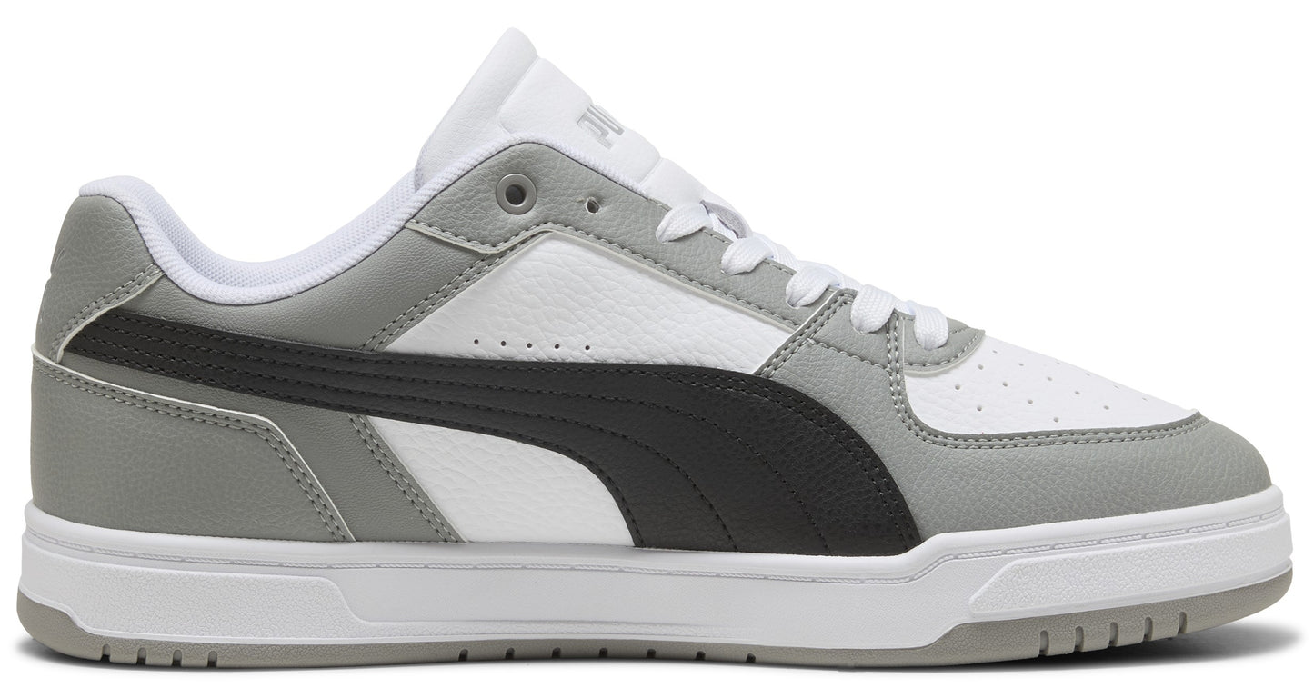 Low top white, gray, and black sneaker with laces.