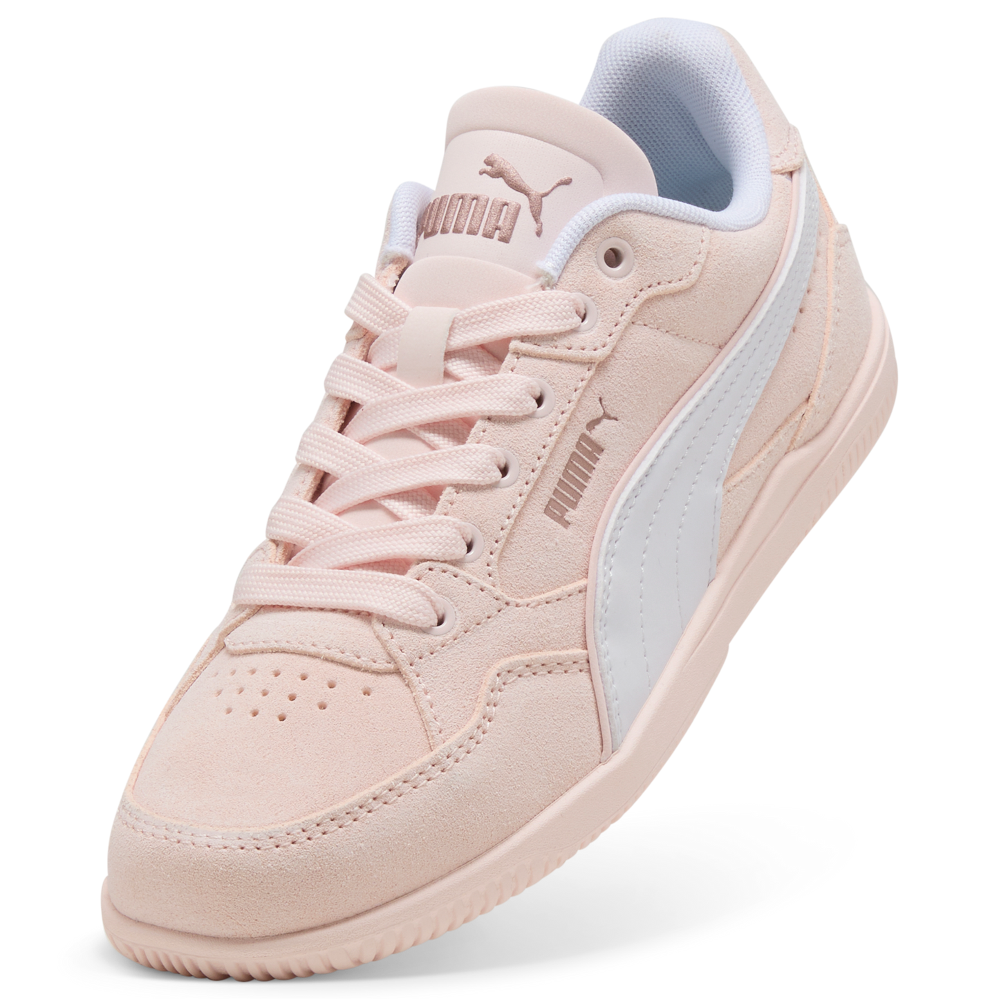 Low-top pink sneaker with white stripe, white lining, and the word PUMA on the side and tongue