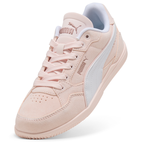 Low-top pink sneaker with white stripe, white lining, and the word PUMA on the side and tongue
