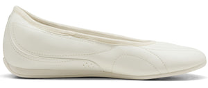 A white flat shoe.