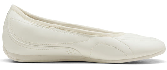 A white flat shoe.