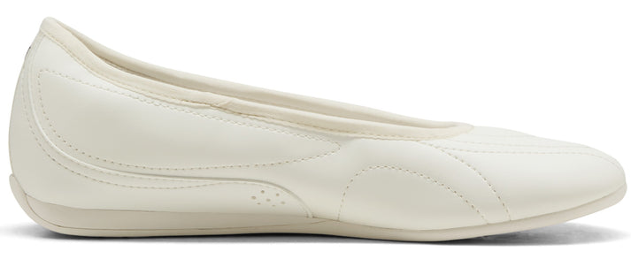 A white flat shoe.