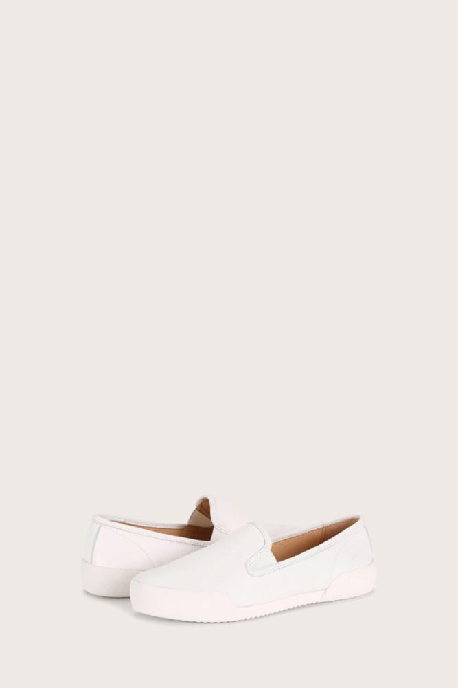 Two white slip-on shoes.