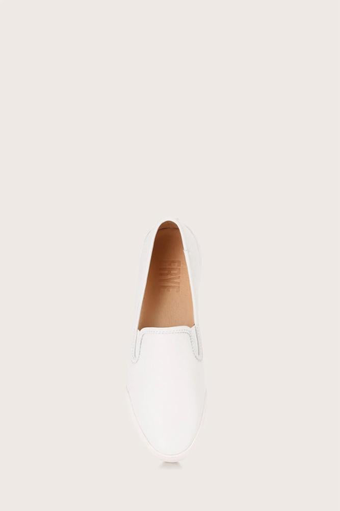 White slip-on shoe, top view.