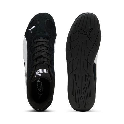 Pair of shoes, suede uppers, white logo on side, black soles, view from top.
