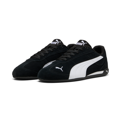 Black suede sneaker with white stripe and laces.