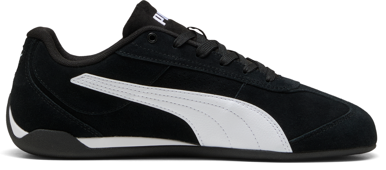 A black sneaker with white stripes.