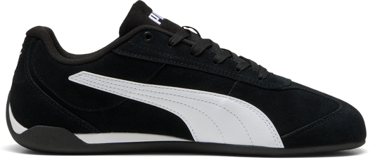 A black sneaker with white stripes.