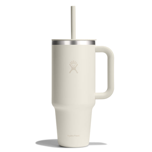 White insulated mug with handle and straw.