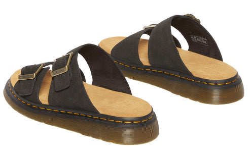 Pair of black sandals with adjustable buckle straps and tan insoles.