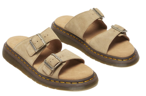 Pair of light tan sandals with two adjustable straps and buckle closures.