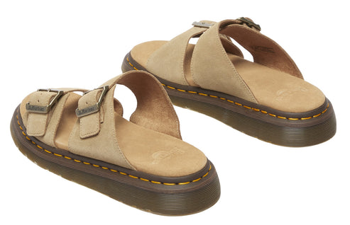 Pair of tan sandals with adjustable buckle straps and thick soles.