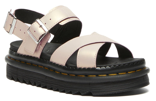 Pink platform sandals with adjustable straps.