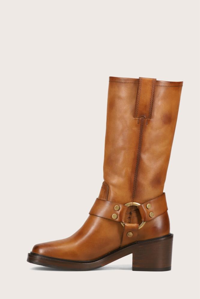 Knee-high brown leather boot with a block heel and a harness around the ankle.