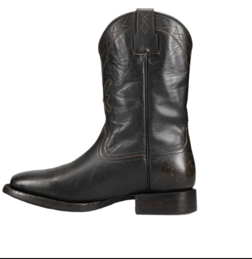 A black leather cowboy boot with decorative stitching.