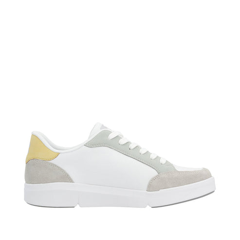 White sneaker with gray and yellow accents and white laces.