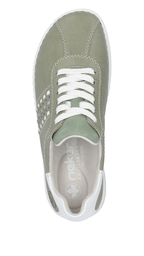 Top-down view of a green sneaker with white laces and white accents on the heel and sole, interior shows brand imprint.