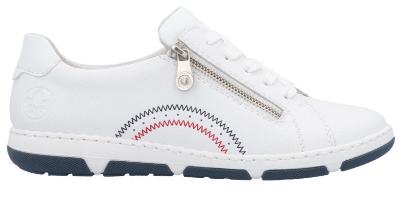White sneaker with a zipper closure and multi-color stitched detail on the side, sitting on a dark blue sole.
