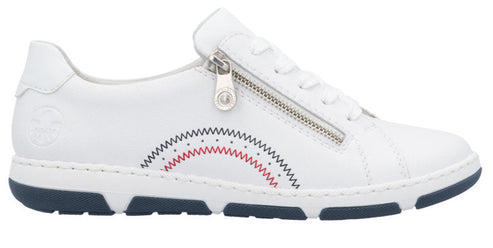 White sneaker with a zipper closure and multi-color stitched detail on the side, sitting on a dark blue sole.