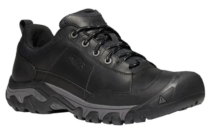 Black leather hiking shoe with lace-up closure and a gray rugged sole.
